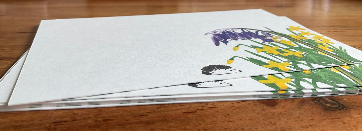 A stack of 350gsm recycled FSC certified card stock