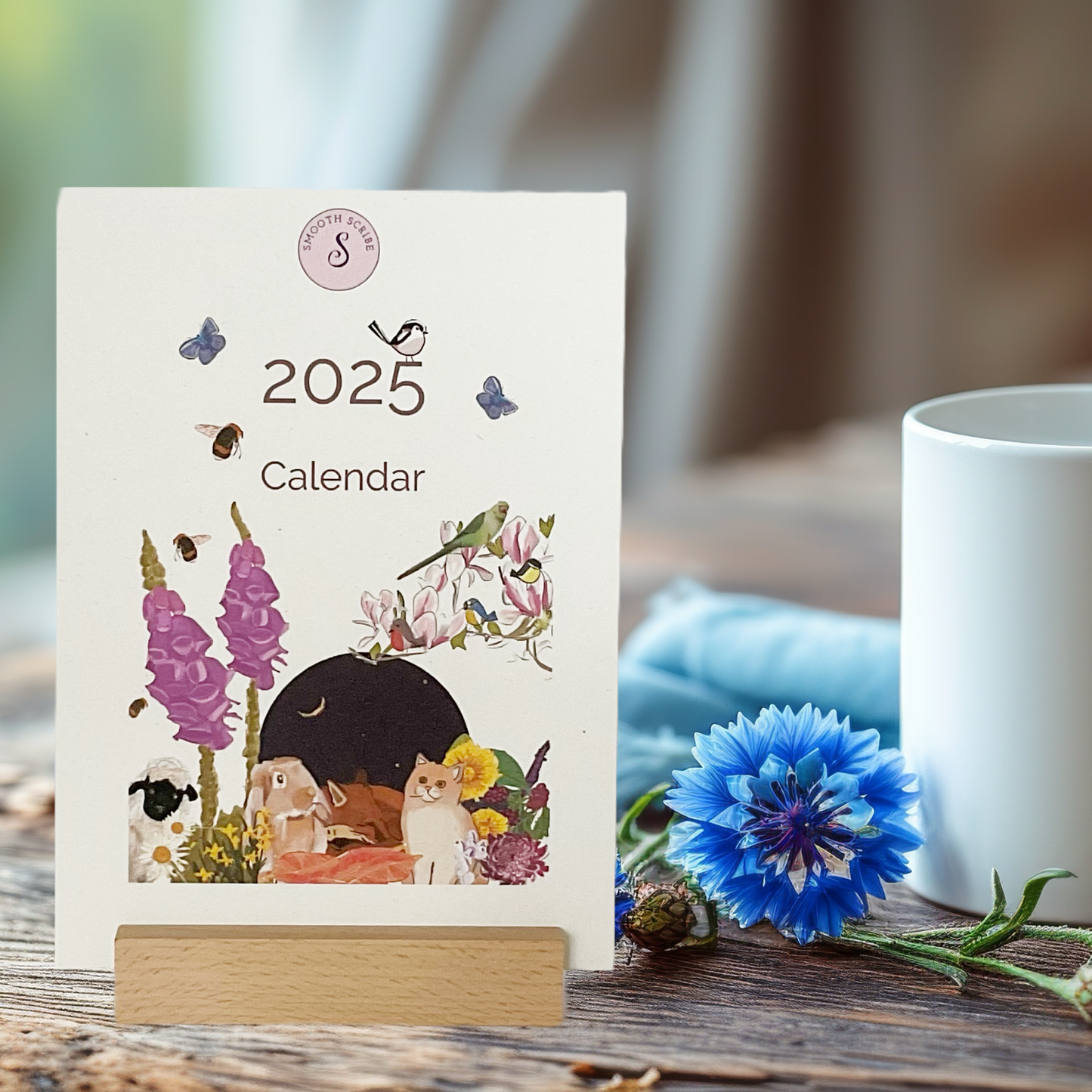 2025 eco desk Calendar on a cream background with vibrant hand drawn illustrations